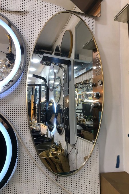 مراية بيضاوية بإطار ذهبي